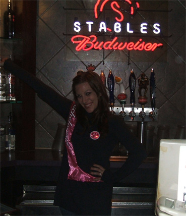 Jessica Harp Posing Under the Stables Sign